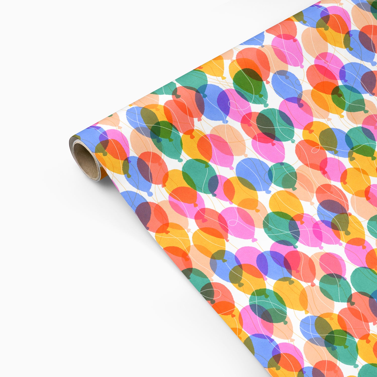 Roll of colorful balloon-patterned wrapping paper on a white background