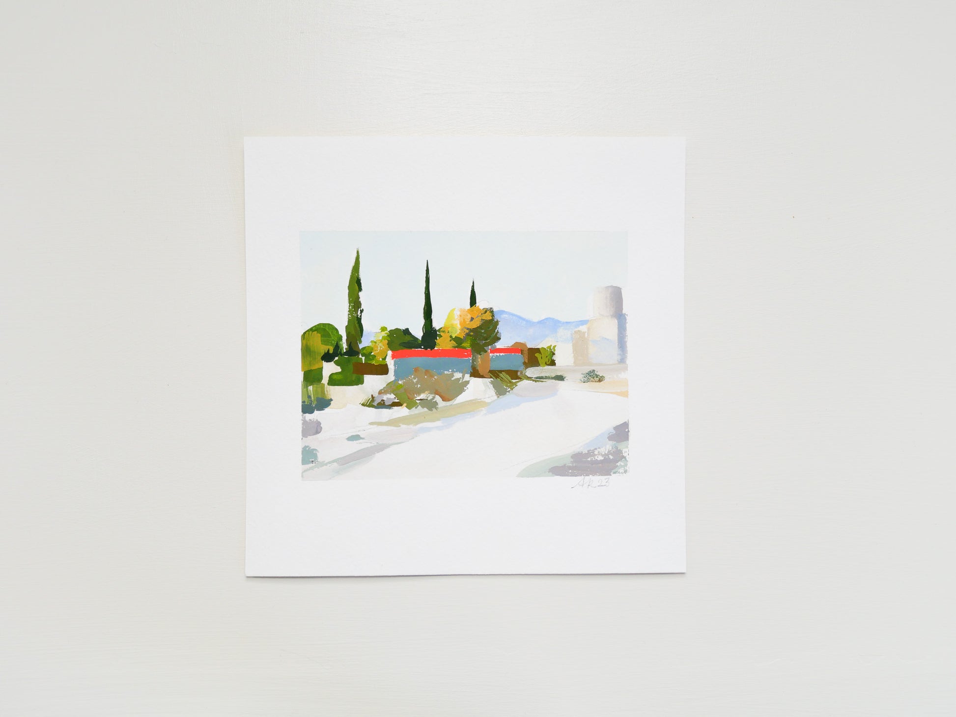 Bright modern desert landscape with trees, buildings, and bold color. Red-lidded dumpsters create bold geometric graphic shapes in the composition.